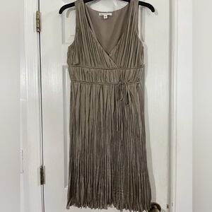 The brand is Banana Republic, it is size 6, the color is a taupe grey.